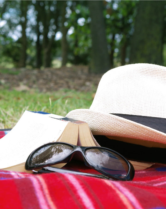 The Gift of Slowness: Why a Blanket Belongs in Every Summer Moment